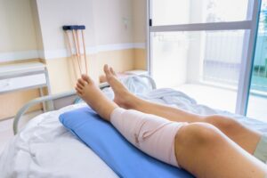 muscle flossing technique on patient's calf