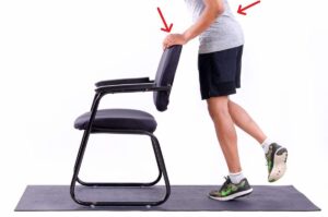 Patient performing single-leg heel raise endurance test